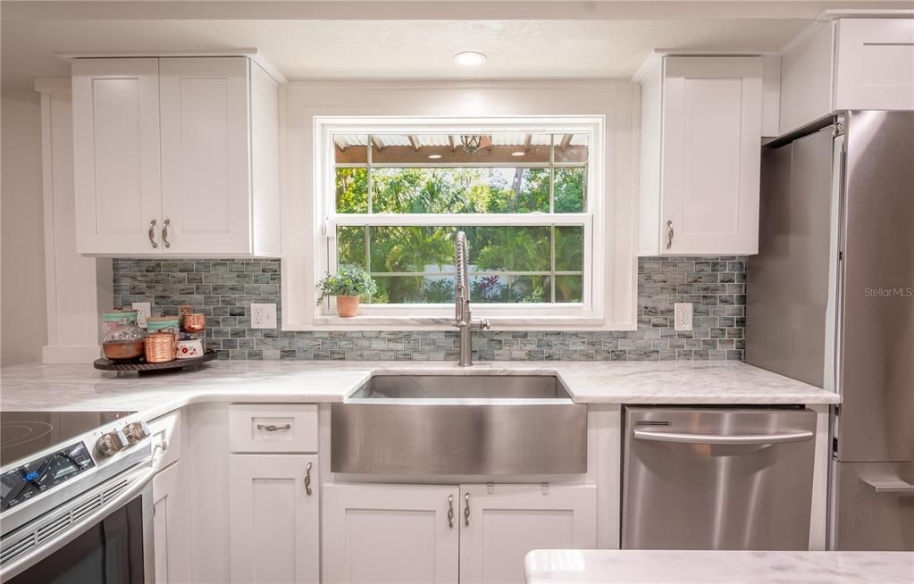 The kitchen comes with a suite of high-end stainless steel appliances.