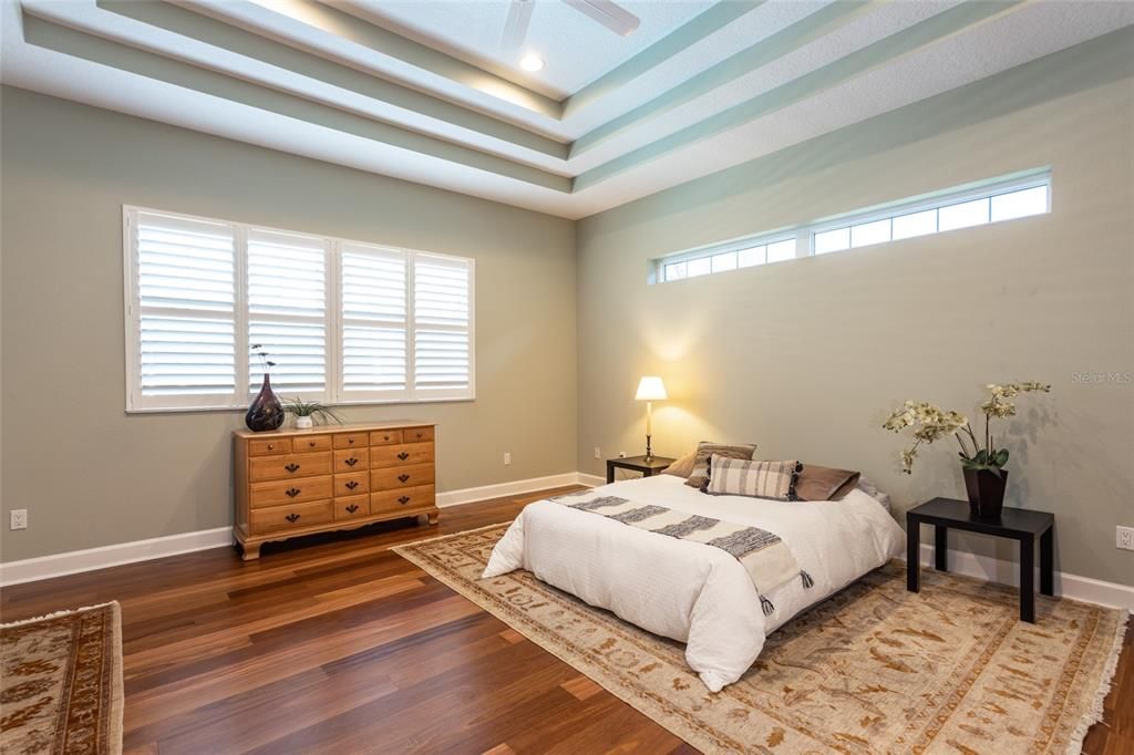 Heavenly Primary Bedroom With Plantations Shutters