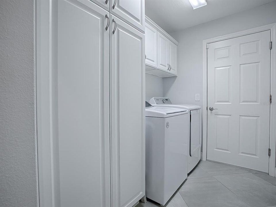 LAUNDRY ROOM WITH LARGE PANTRY