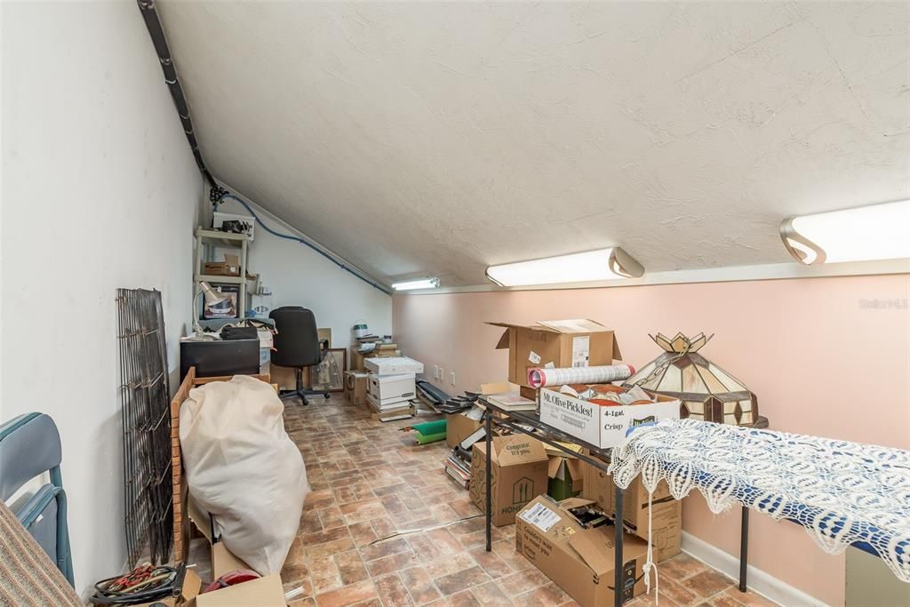 Upper level Storage Room with Garage Access (pull-down stairs)