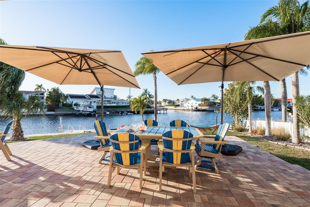 Pavered pool deck with fabulous water views