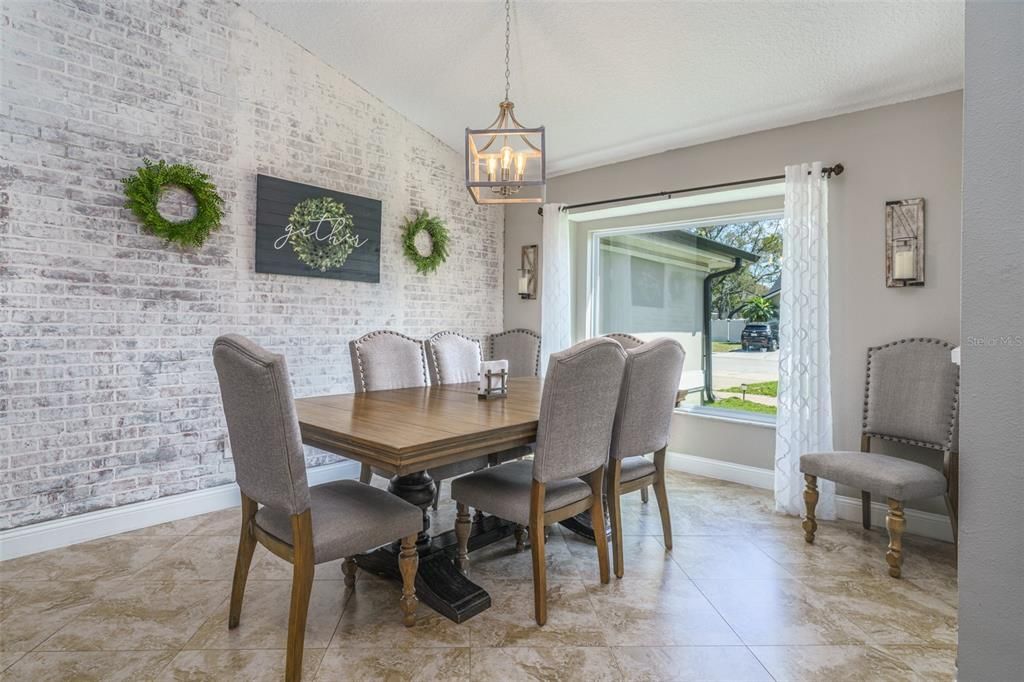 Dining room is large enough to seat a large family and great for holiday gatherings.