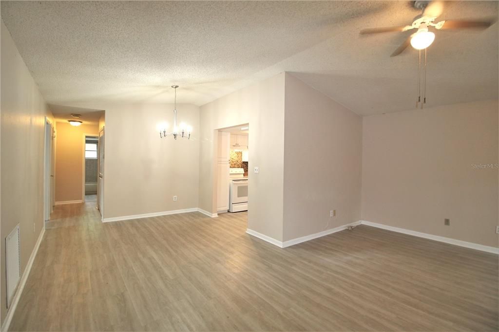 iLiving / Dining room combo, open floorplan with cathedral ceiling