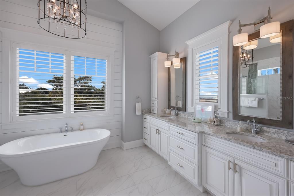Beautiful primary bathroom with soaking tub - yes you get views from tub too!