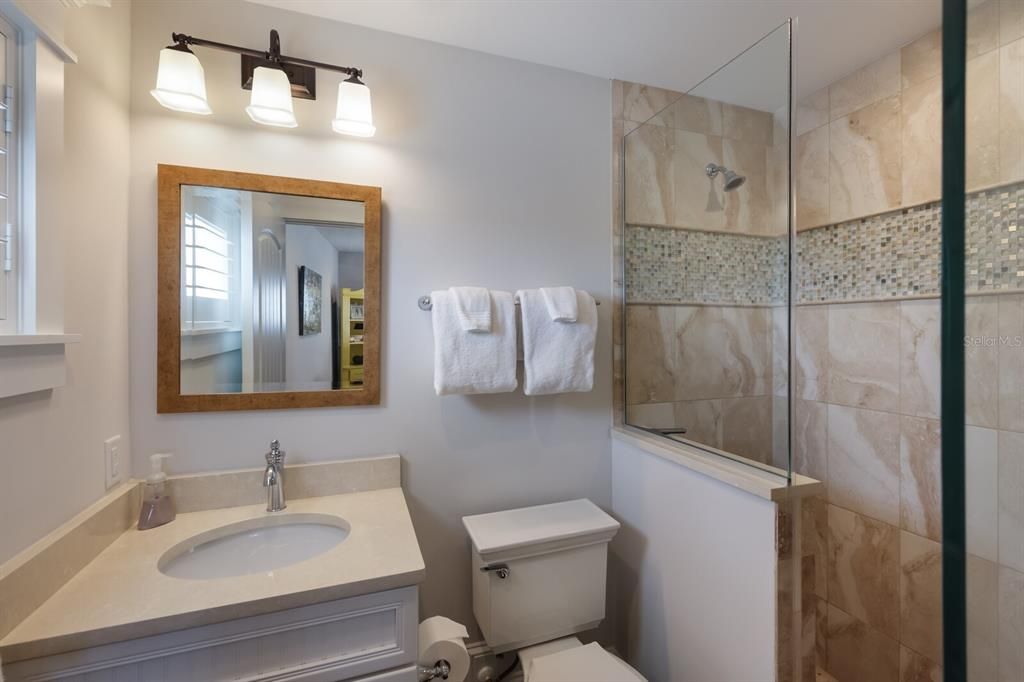 bathroom 4 on the 5th level - en suite to the bonus room and easy access from the roof top deck!