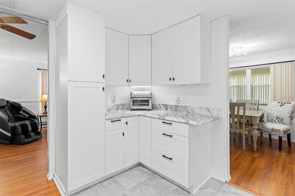 VIEW OF EXTRA STORAGE AREA WITH FULL OUTS AND LARGER DRAWER SPACE FOR POTS AND PANS