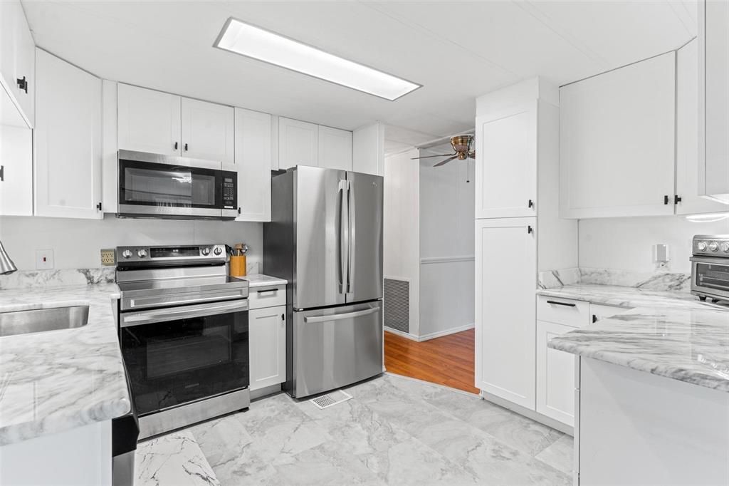 LIGHT AND BRIGHT KITCHEN, PANTRY WITH PULL OUTS AND LOTS OF EXTRA STORAGE