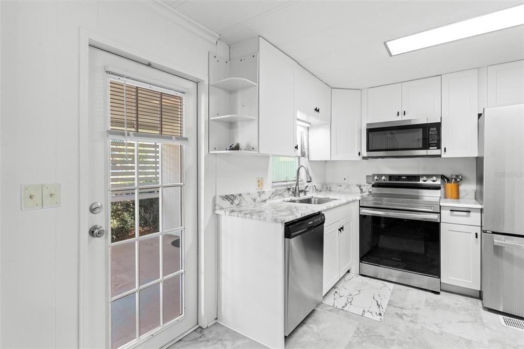 KITCHEN WITH NEWER APPLIANCES