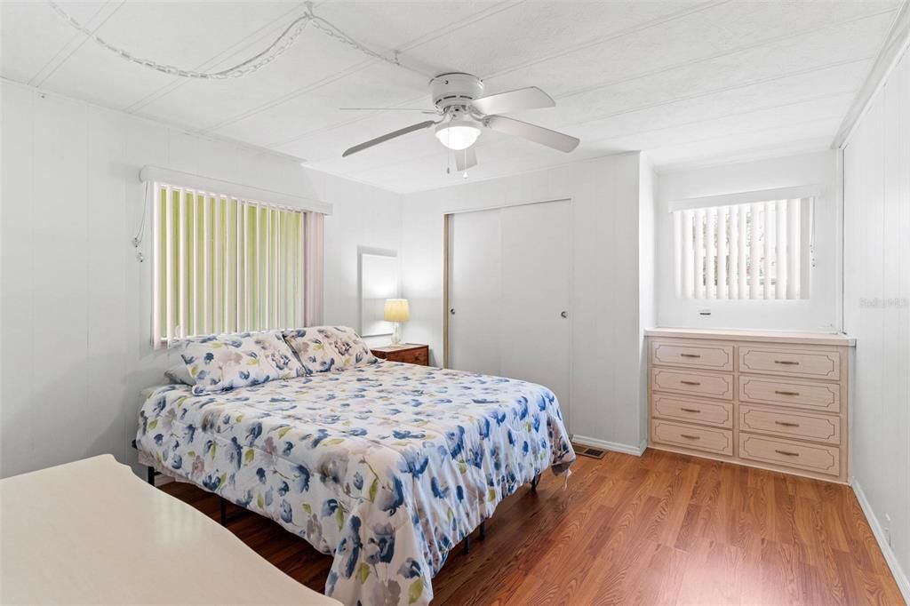 GUEST BEDROOM WITH CLOSET AND BUILT-IN DRESSER