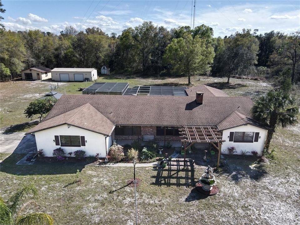 4/3 pool home on 3 acres with two large outbuildings.