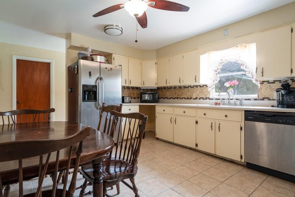 Home features a spacious Kitchen with laminate counter tops