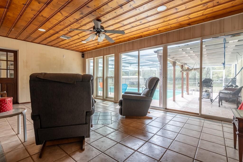 The Florida sun room is a perfect addition to the home with tiled floors throughout