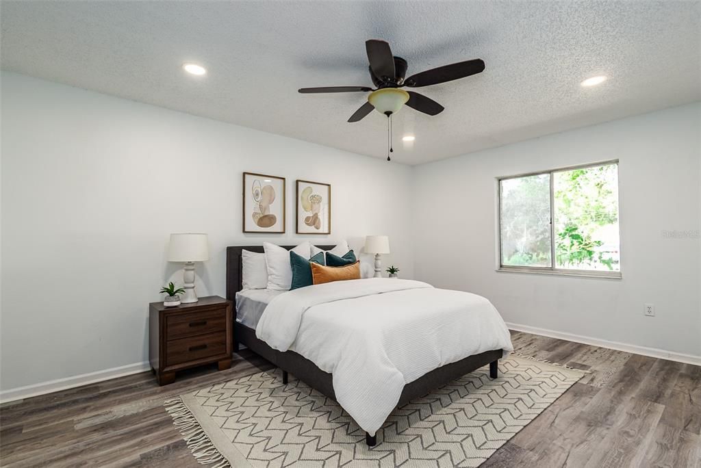 Primary Bedroom with En-suite Bath and Walk in CLoset