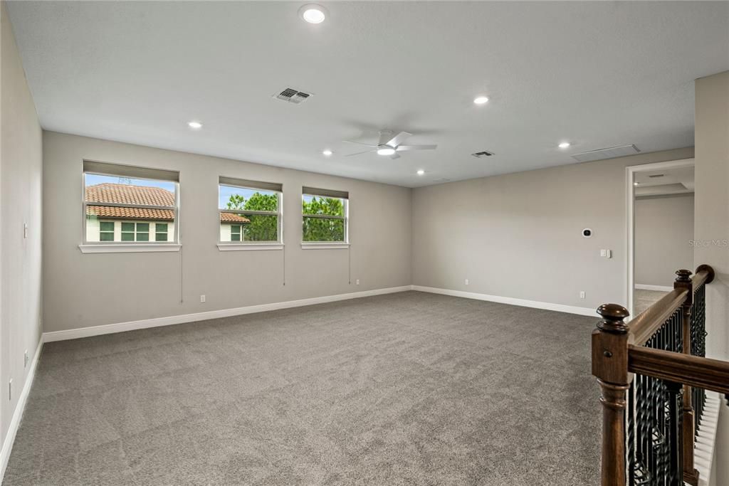 Second level bonus room offers a great place for game night with family and friends