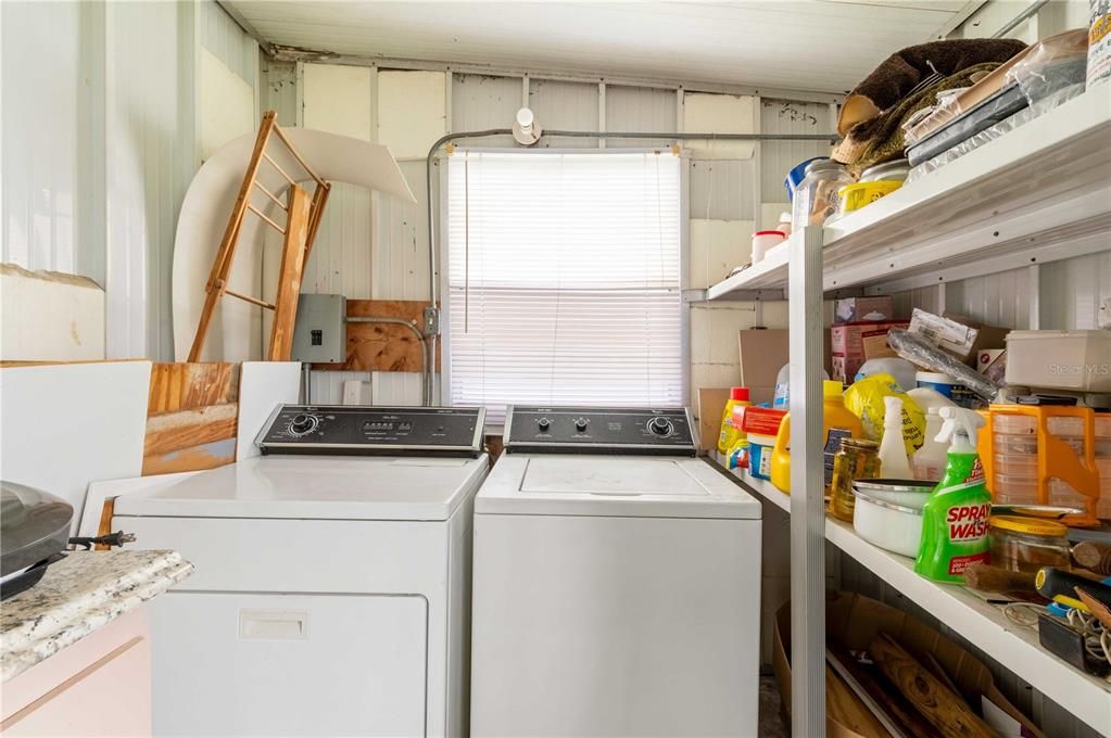 Laundry area is off Florida room.