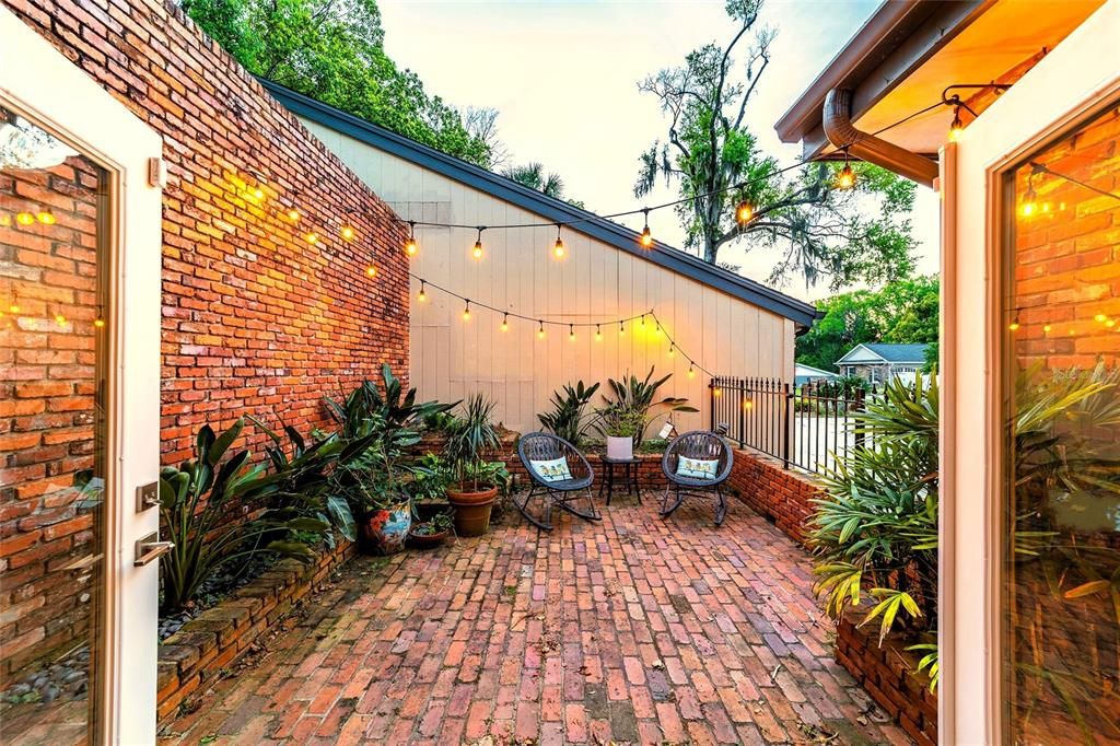 Brick courtyard outside family room