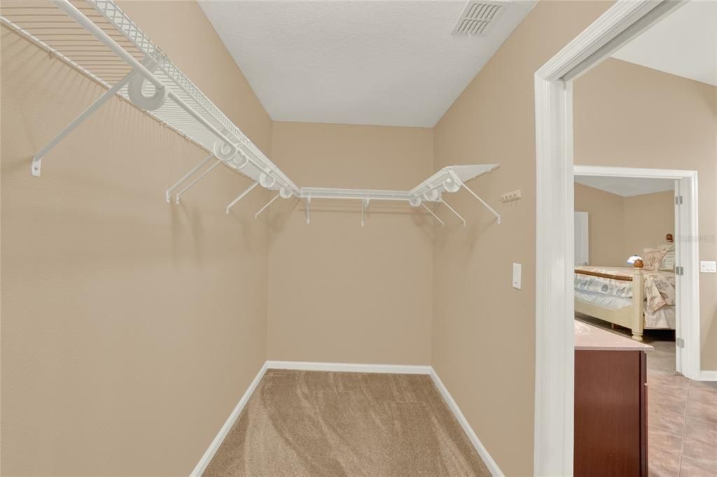 1 of 2 Primary room walk-in closets