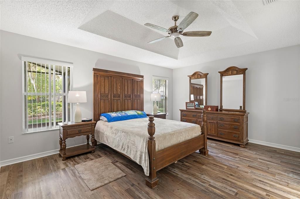 Master ensuite with Luxury vinyl plank flooring, Tray ceiling.