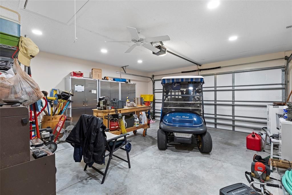 2 car garage with ceiling fan, insulated garage door, sliding screen door over garage door, Whole house water treatment system.