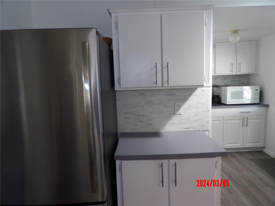 Stainless Steel Refrigerator with even more cabinets and Counter space