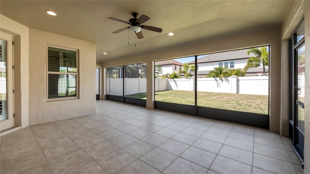 Oversized 31-by-28-foot covered and screened lanai.  Backyard has room to add a pool!