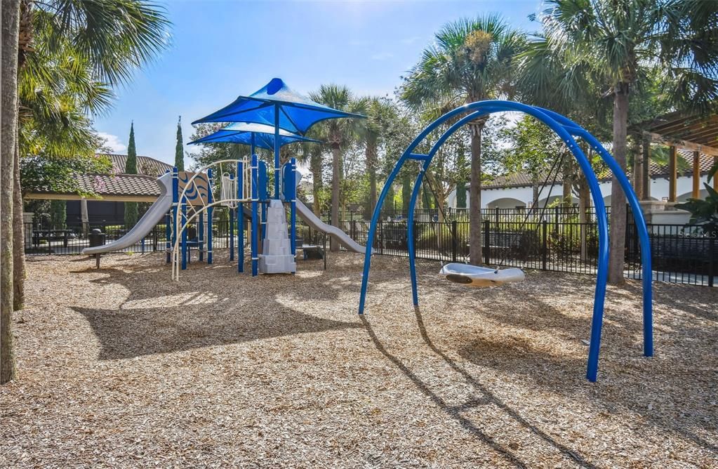 Parkside Clubhouse, soccer field, tennis courts, playground, and community pool. Walkable to Dr. Phillips Community Park.