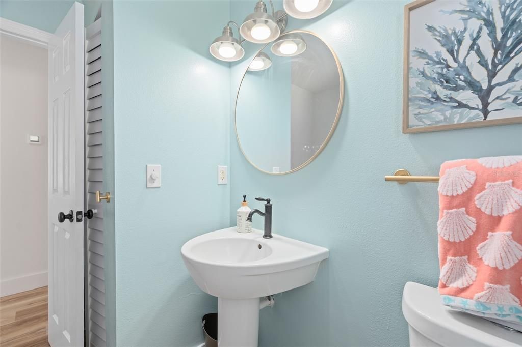 Gorgeous upstairs bathroom with linen closet and designer paint colors.