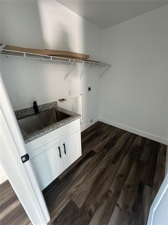 LAUNDRY ROOM WITH SINK UPGRADE (MODEL HOME- SUBJECT TO CHANGE IN COLORS AND FIXTURES)