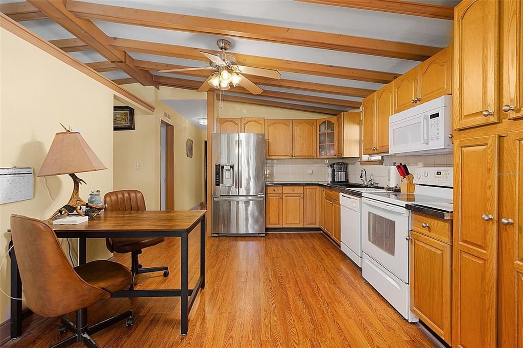 Kitchen with High Beam Ceiling