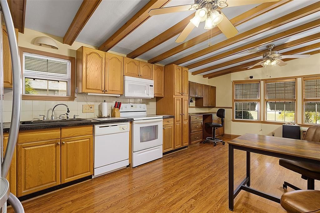 Kitchen with High Beam Ceiling