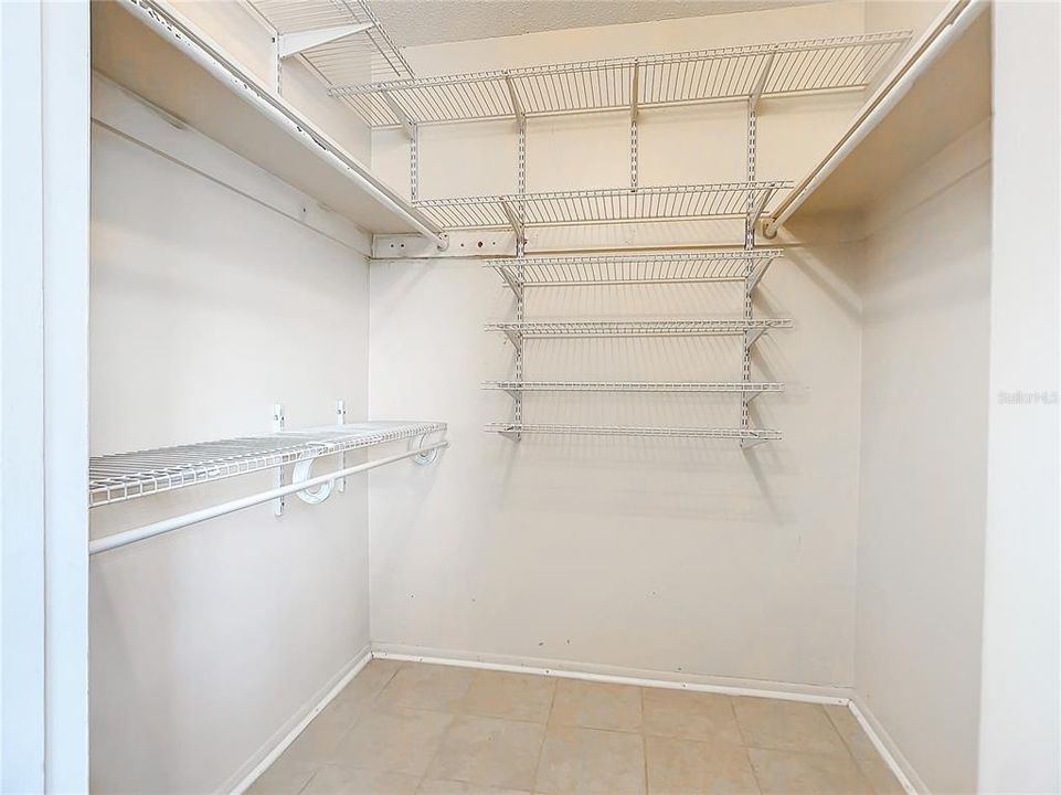 Walk-In Closet with Ventilated Shelving