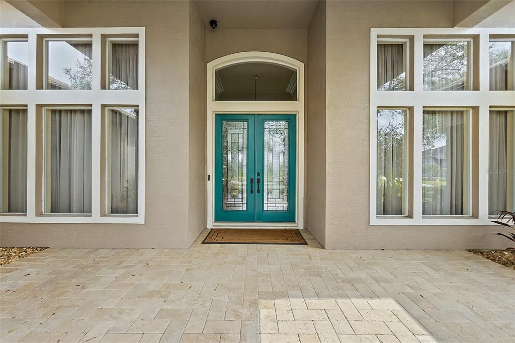 Front Porch w/Travertine Tile Leads to Front Door