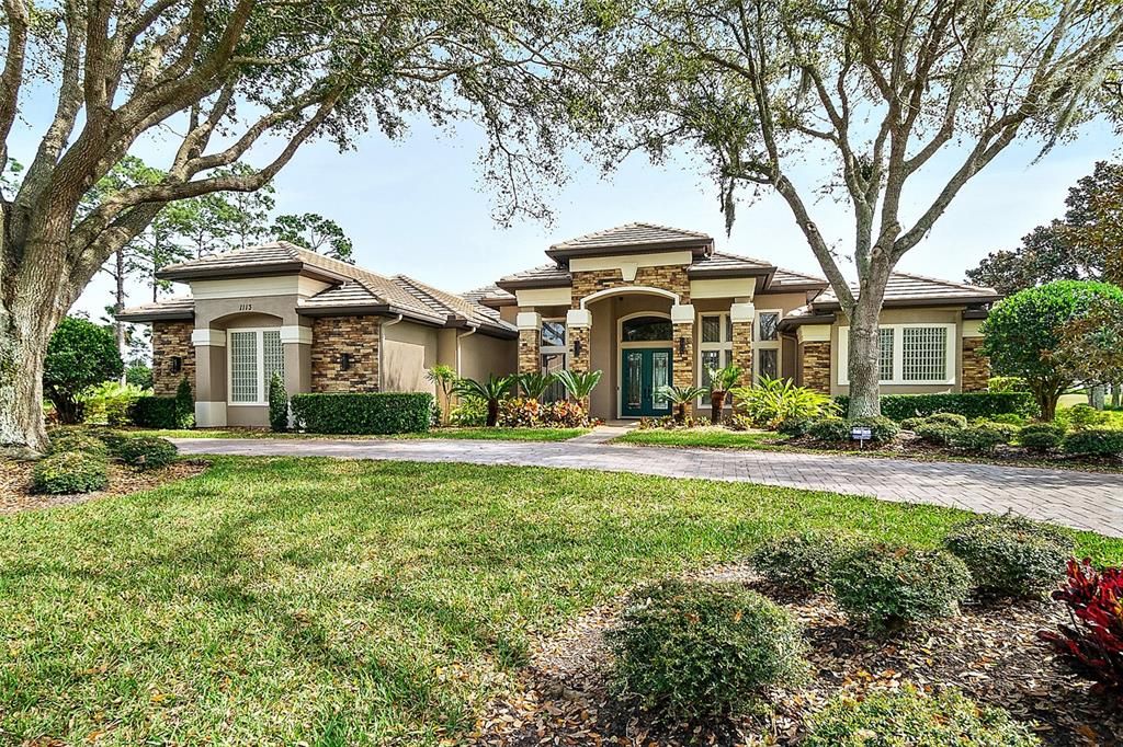 Beautiful Curb Appeal w/Circular Drive, Trees, and Flower Beds
