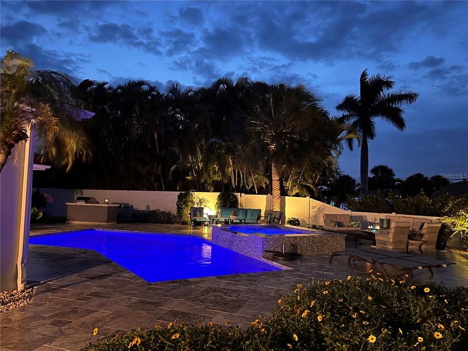Programmable pool and landscape lighting adds a touch of glamor to your perfect Florida evenings!