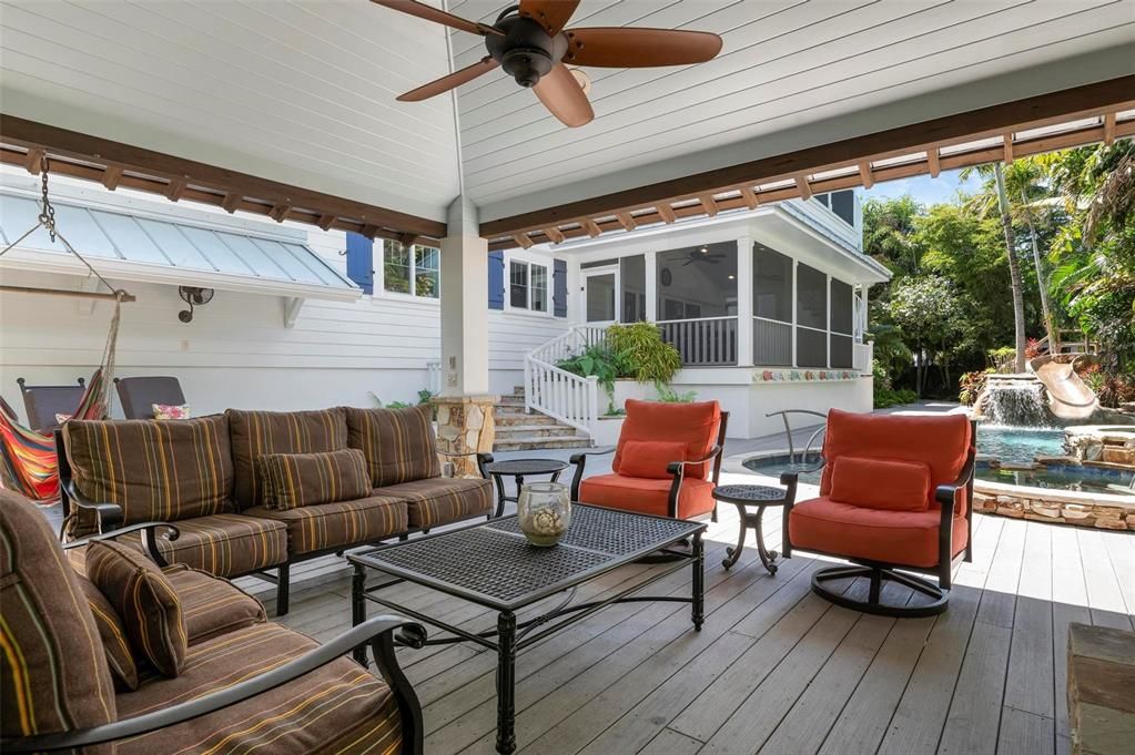 Outdoor pool cabana with outdoor gas fireplace