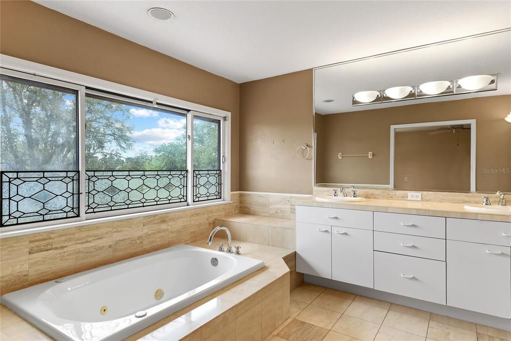 Primary Bath w/ Jetted Tub over-looking Golf Course