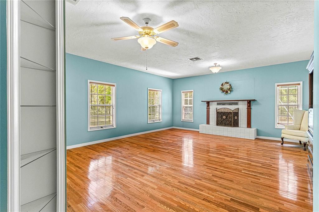 Primary Bedroom downstairs with fireplace.