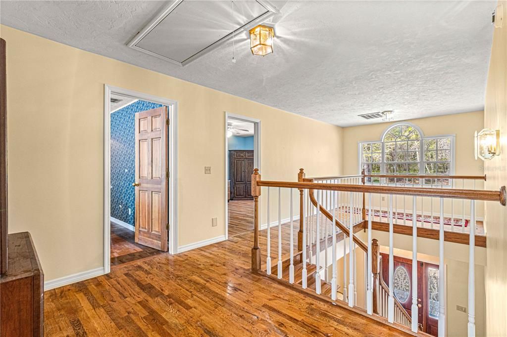 Sunlit upstairs with 3 bedrooms and 2 baths.