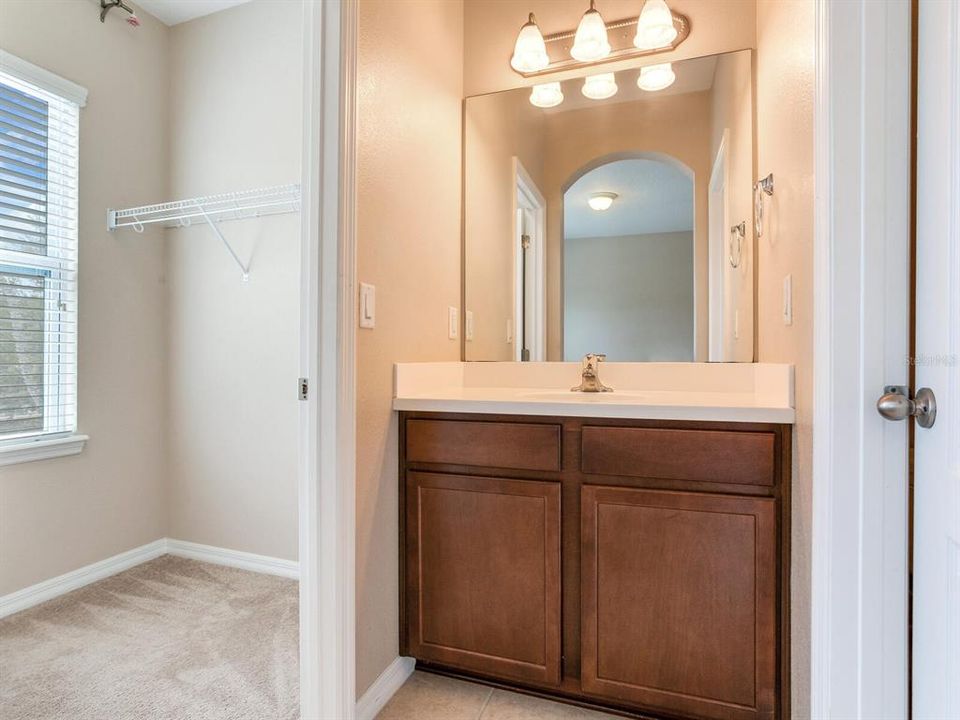another vanity room that connect to the jack and jill bathroom and toilet