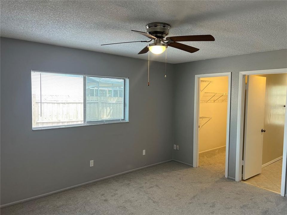 Primary Bedroom with walk in closet and bathroom