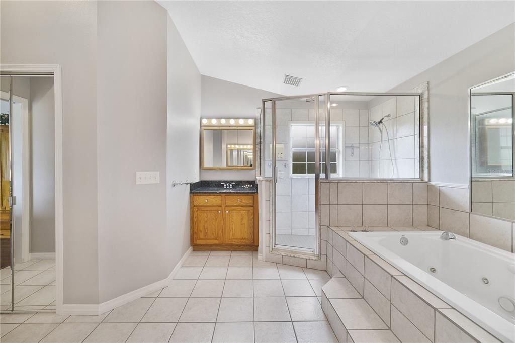 Dual/split vanities, a jetted soaking tub and large separate shower allow you to start and end your day with ease!