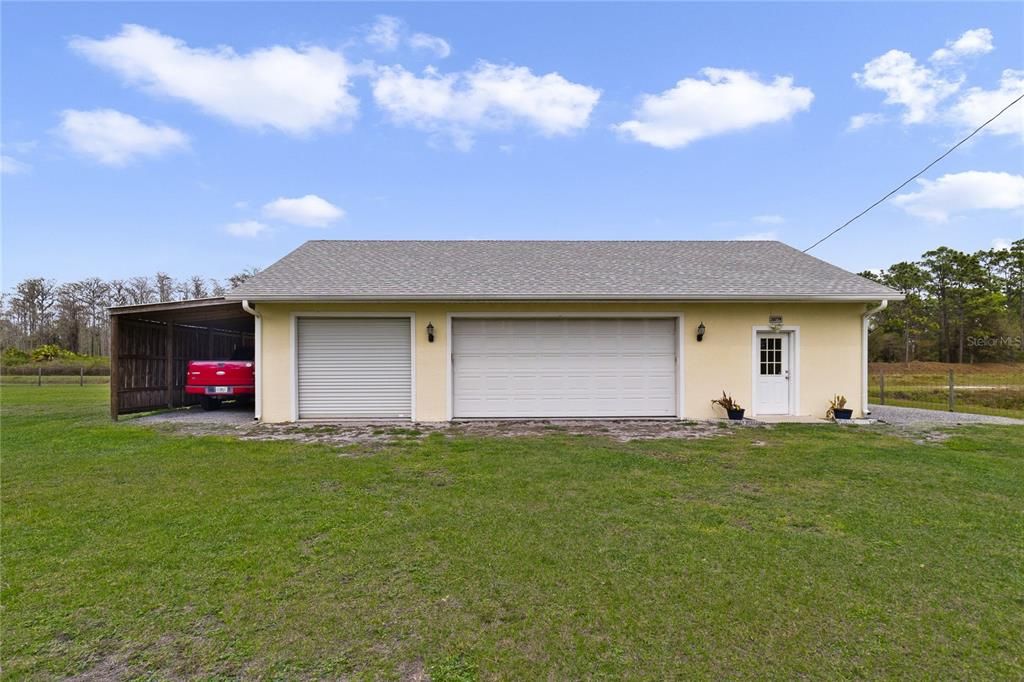 This 2.09 ACRE property is fenced and gives you endless storage options in the shed (w/windows and an A/C unit!) and the huge workshop with space to park 3+ cars, plus 2 OFFICE SPACES and it has its own separate address and utilities to easily convert to an ADU (would need to connect to septic/water)!