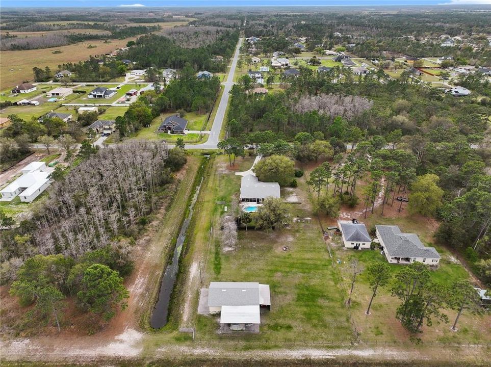 Spacious, peaceful and private, this home enjoys easy access to everything the Wedgefield area has to offer and Hal Scott Preserve is practically in your backyard!