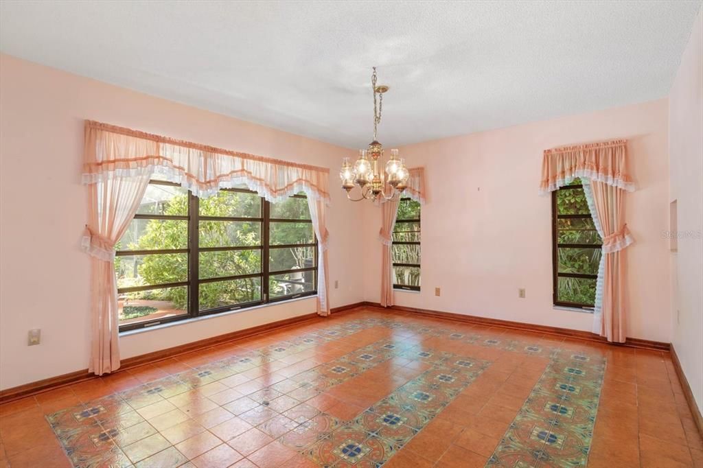 Enjoy entertaining in this dining room complete with accent tile and picture window