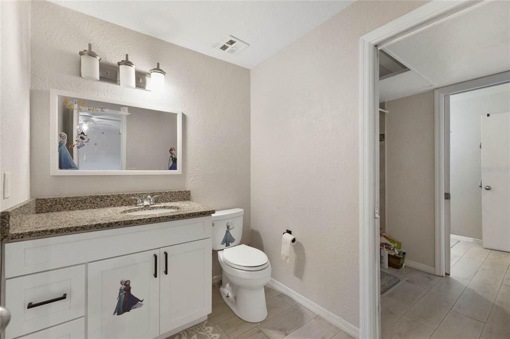 681 Seminole Ave Full bathroom shared by bedrooms #2 & #3.