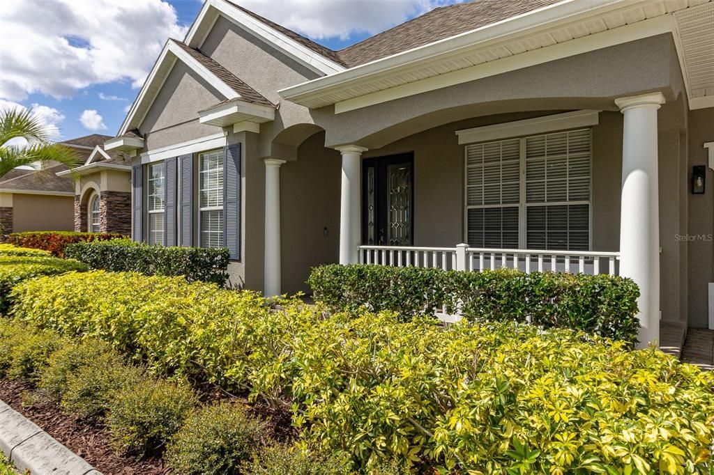 Gorgeous curb appeal with matured landscaping