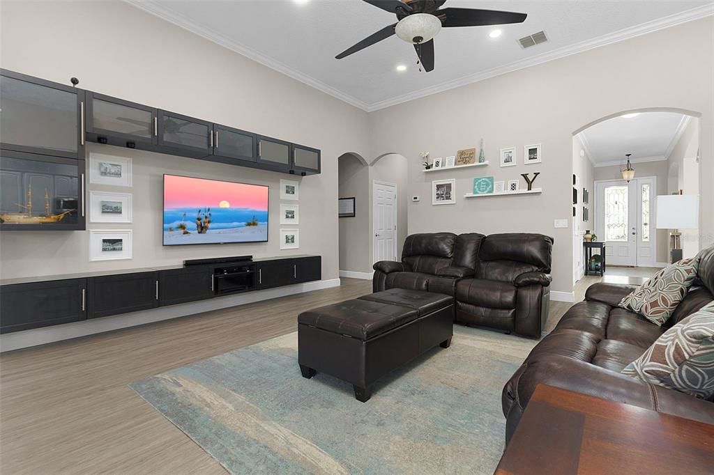 Enormous living room with a built-in entertainment center
