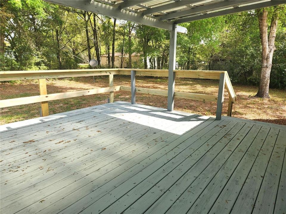 Deck Overlooks Backyard
