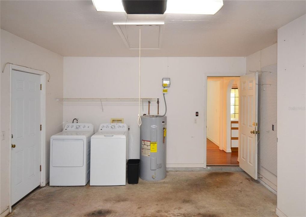 washer and dryer and water heater are in 1 car garage