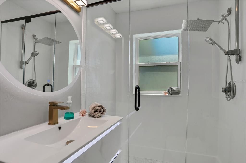 Floating vanity, glass shower